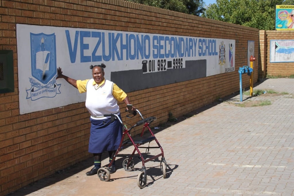 SGB chairwoman Tshidi Nyembe Tshidi celebrates Vezukhona's outstanding achievement. Photo by Phineas Khoza