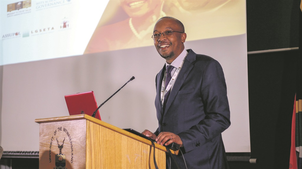 SA Local Government Association president Parks Tau leads the panel discussion of leadership conversations at the Wits School of Governance.