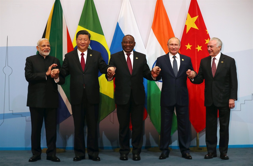 India’s Prime Minister Narendra Modi, China’s President Xi Jinping, South Africa’s President Cyril Ramaphosa, Russia’s President Vladimir Putin and Brazil’s President Michel Temer pose for a group picture at the Brics summit meeting in Johannesburg on Thursday (July 26, 2018). Picture: Mike Hutchings/Reuters
