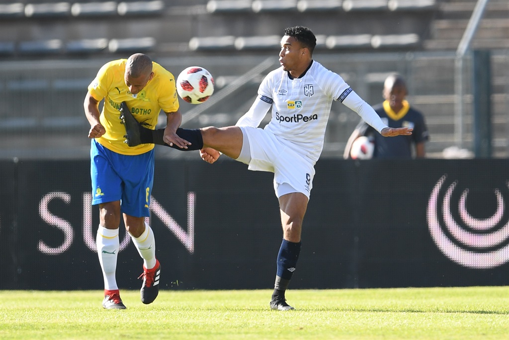Matthew Rusike of Cape Town City makes a challenge during their MTN 8 match against Mamelodi Sundowns. Picture: Lefty Shivambu/Gallo Images