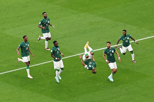Saudi Arabia celebrate scoring against Argentina in the 2022 FIFA World Cup
