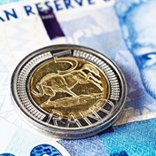Rand takes a hit as dollar rallies on rate-cut jitters
