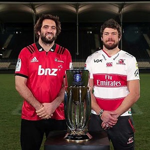 Lions and Crusaders captains pose with the Super Rugby cup