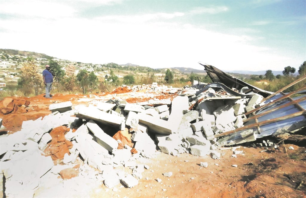 devastated This pile of rubble is what was left when 28 houses were demolished at Phumlani VillagePHOTO: Sizwe Yende