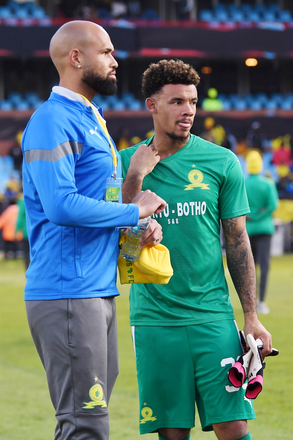 PRETORIA, SOUTH AFRICA - MAY 20: Mamelodi Sundowns players Reyaad Pieterse and Ronwen Williams looks dejected during the CAF Champions League match between Mamelodi Sundowns and Wydad Athletic Club at Loftus Stadium on May 20, 2023 in Pretoria, South Africa. (Photo by Lefty Shivambu/Gallo Images)