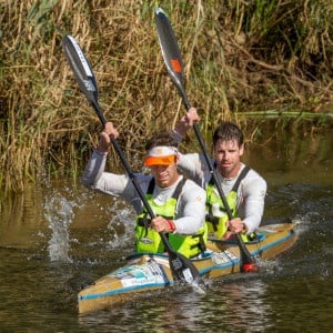 Greg (front) and Ryan Low power away to win the final stage of the Breede River Canoe Marathon  (Kassie Karstens/
Gameplan Media)

