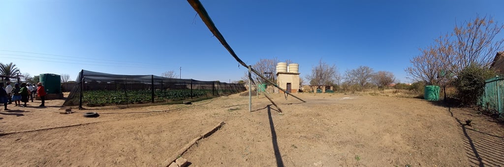 The plot of land used for the project, before (right-hand side) and after (shaded vegetable garden) – St John the Baptist Clinic & Old Age Home, Winterveld. Images supplied by French Embassy, 2022