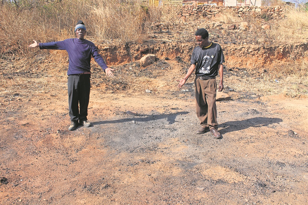 Jeremiah and Aaron Mkhonza say Amos (inset) would still be alive if he had a house.             Photo by Bulelwa Ginindza