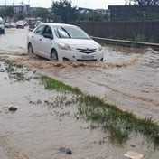 WATCH: Motorists brave flooded road 