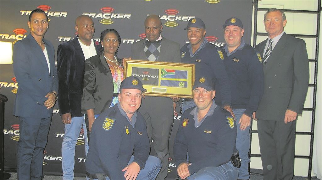 Lieutenant-General Liziwe Ntshinga (third from left) and Tracker’s Ron Knott-Craig (far right) with the winners.