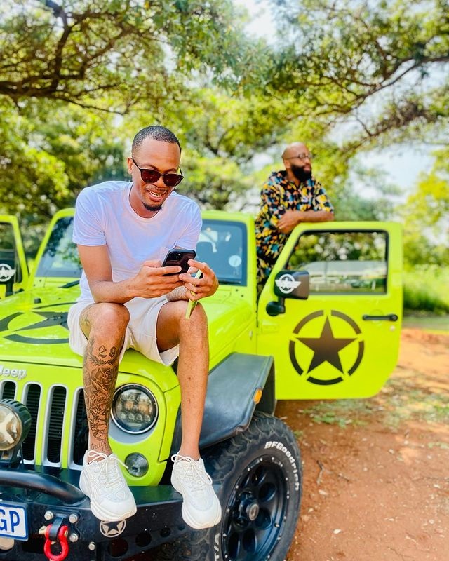 Brighton Mhlongo and Oupa Manyisa rolling with a Jeep Wrangler