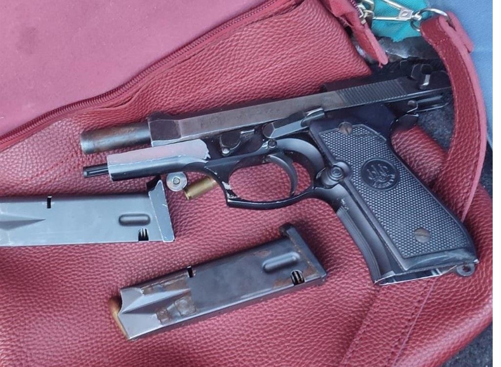The suspect was found in possession of unlicensed firearms and ammunition.