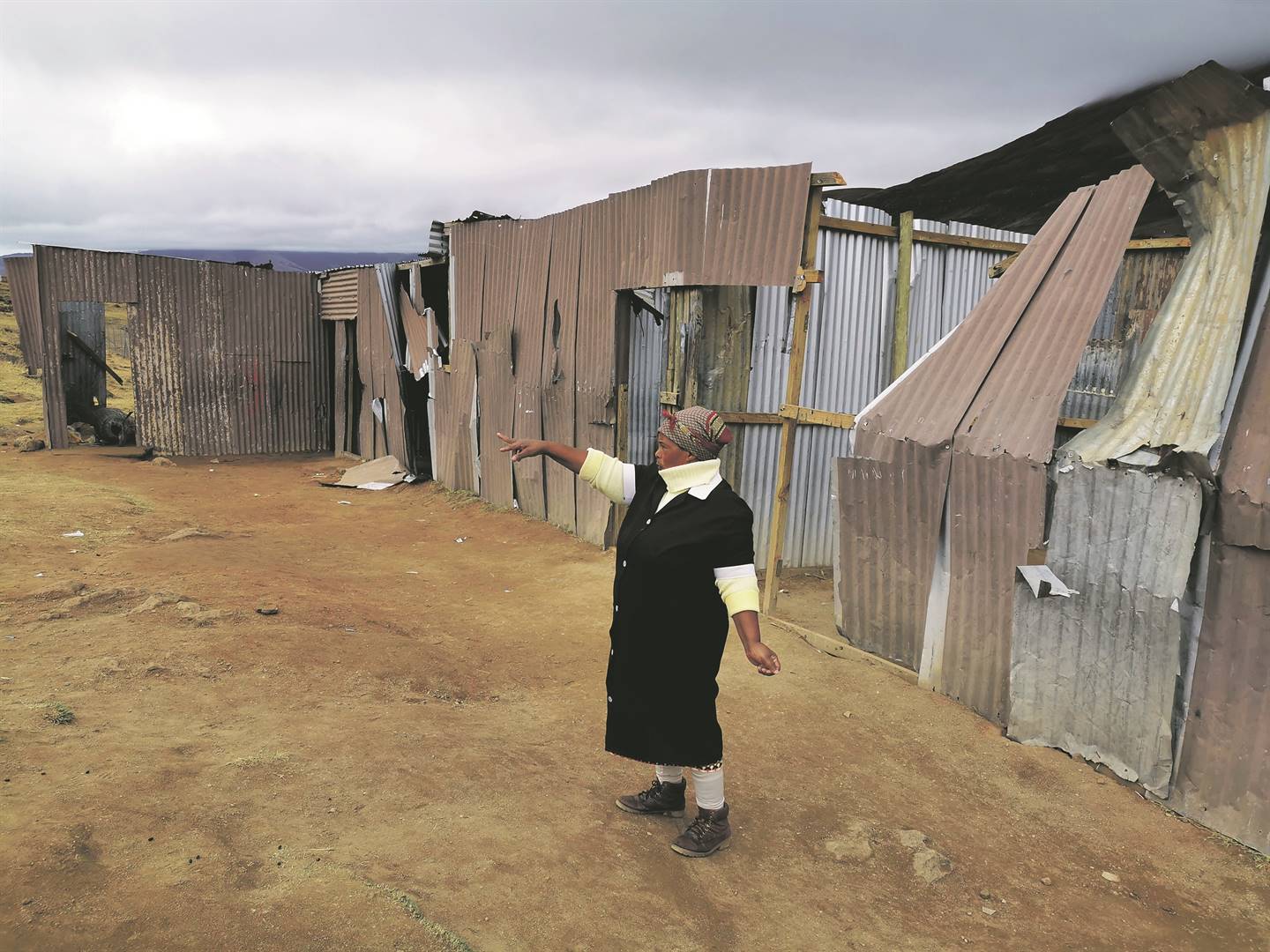 Ndileka Kube stands in front of shacks which are used as classrooms at Mcheni Primary School in Tsolo. Pictures: Lubabalo Ngcukana