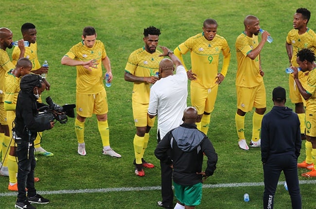 Coach Molefi Ntseki chats to the players at the drinks break during the 2021 Africa Cup of Nations Qualifier match between South Africa and Sao Tome and Principe at Moses Mabhida Stadium on November 13, 2020 in Durban, South Africa.