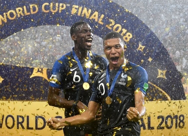 Two of France’s players with African roots, Paul Pogba and Kylian Mbappé, celebrate winning the World Cup. Picture: EPA/Facundo Arrizabalaga