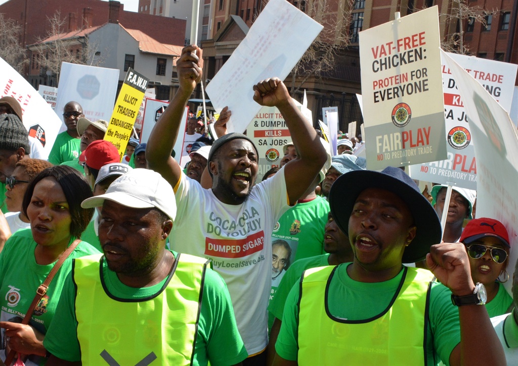 WORKERS MARCH AGAINST ILLEGAL CIGARETTES!