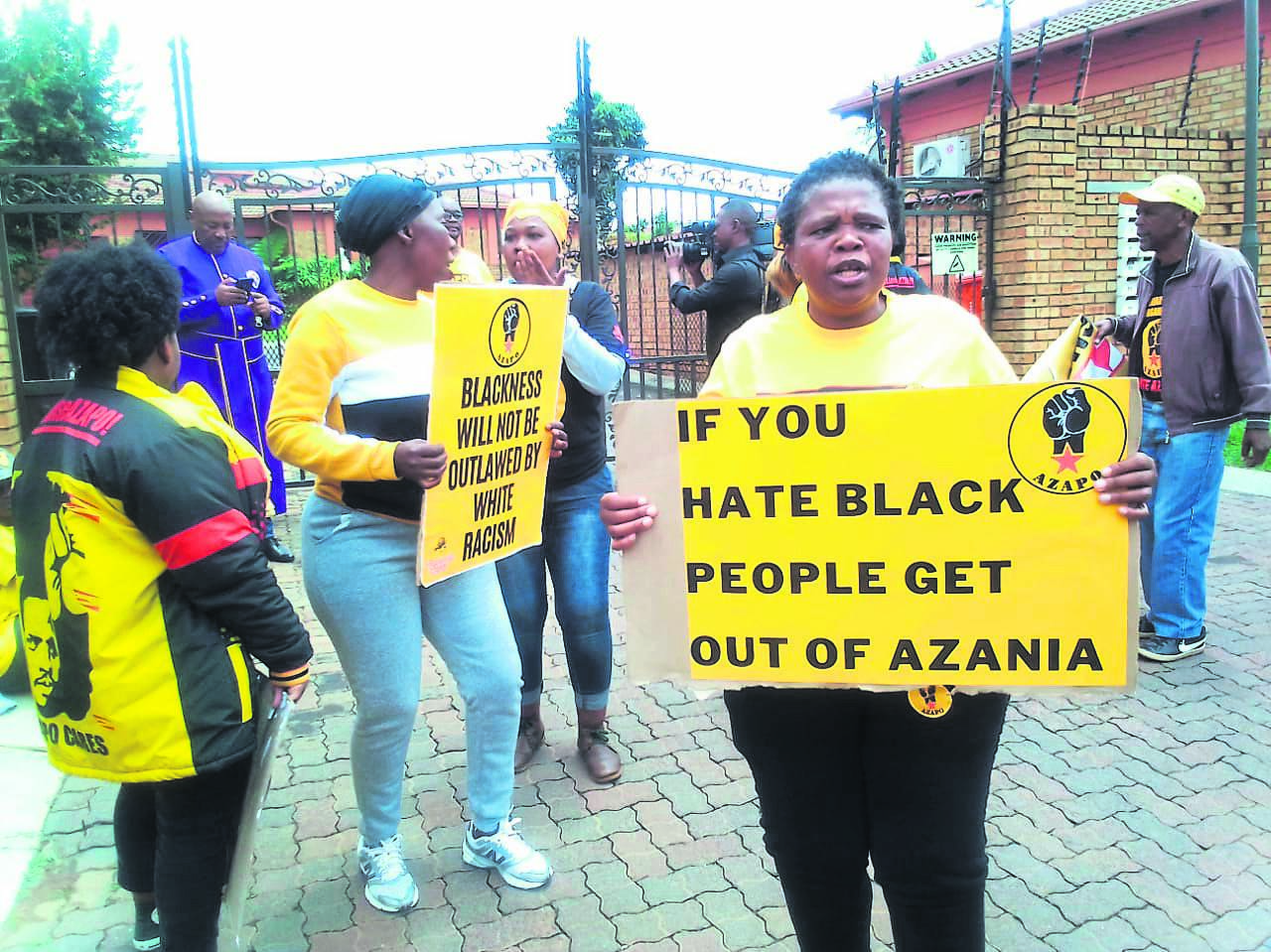 A group of Azapo members staged a picket outside the home of Belinda Magor in Boksburg, Ekurhuleni, yesterday. 