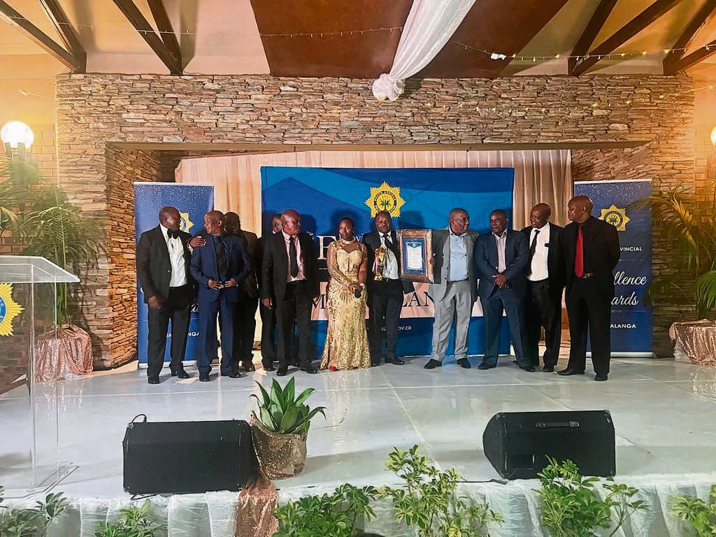 Mpumalanga police commissioner Lieutenant-General Semakaleng Manamela (wearing a gold dress) and MEC Vusi Shongwe (fourth from right) with members of the hardworking task team.