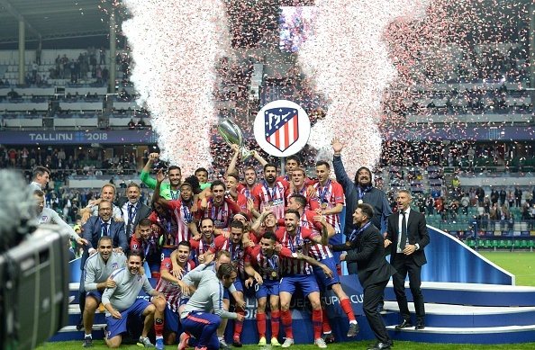 Atletico Madrid's players celebrate after winning the UEFA Super Cup