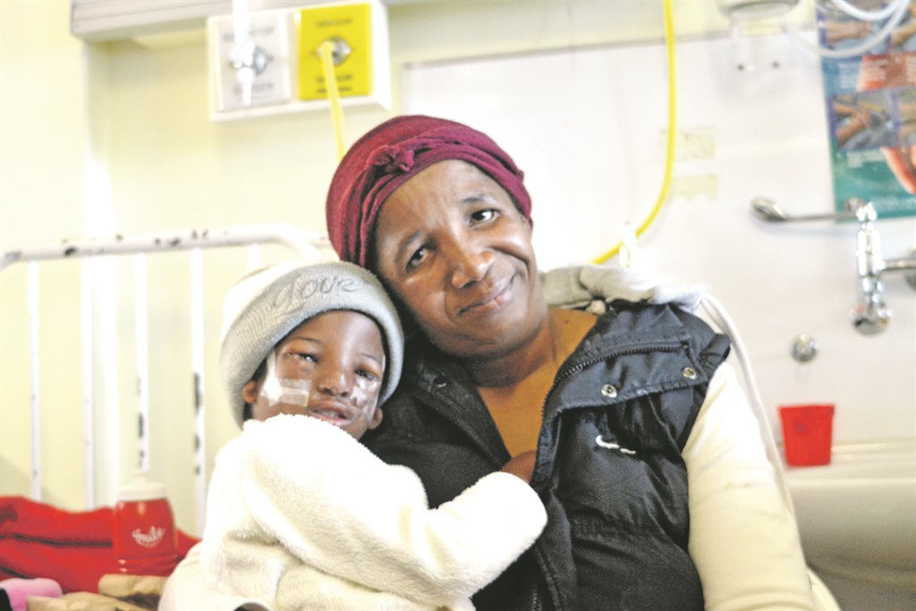Lungelwa Faltein (right) is happy with her daughter, Anelisa’s operation.  Photo by Luvuyo Mehlwana