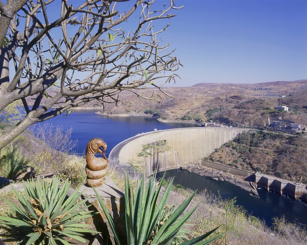 The Kariba Dam is a hydroelectric dam in the Kariba Gorge of the Zambezi river basin between Zambia and Zimbabwe.