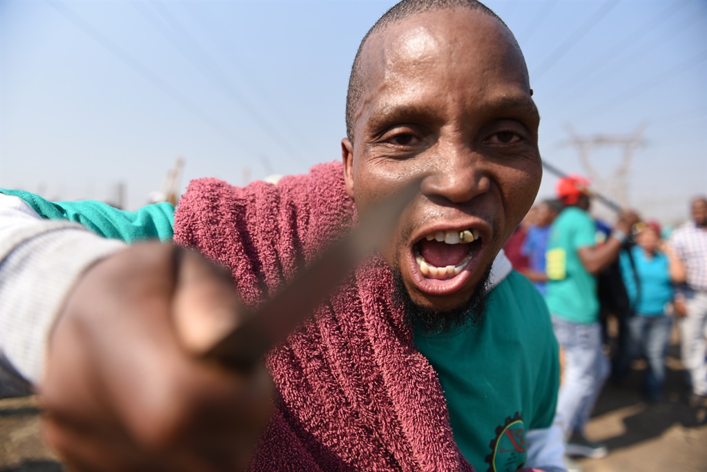A man tried to stab the City Press photographer during the sixth Marikana commemoration event. Picture: Tebogo Letsie