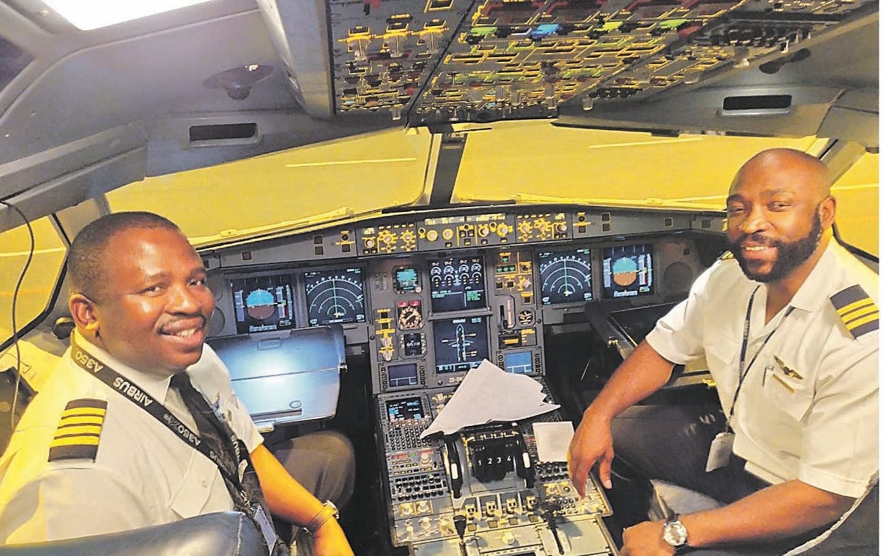 SAA’s chief pilot, Captain Vusi Khumalo (left), and senior first officer Jacob Setlhake were responsible for the aircraft and crew that repatriated 114 South Africans from Wuhan in China last week. Picture: Supplied