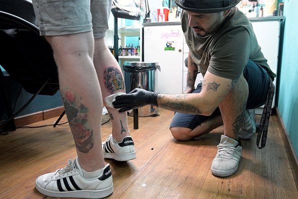 A Lionel Messi ankle tattoo