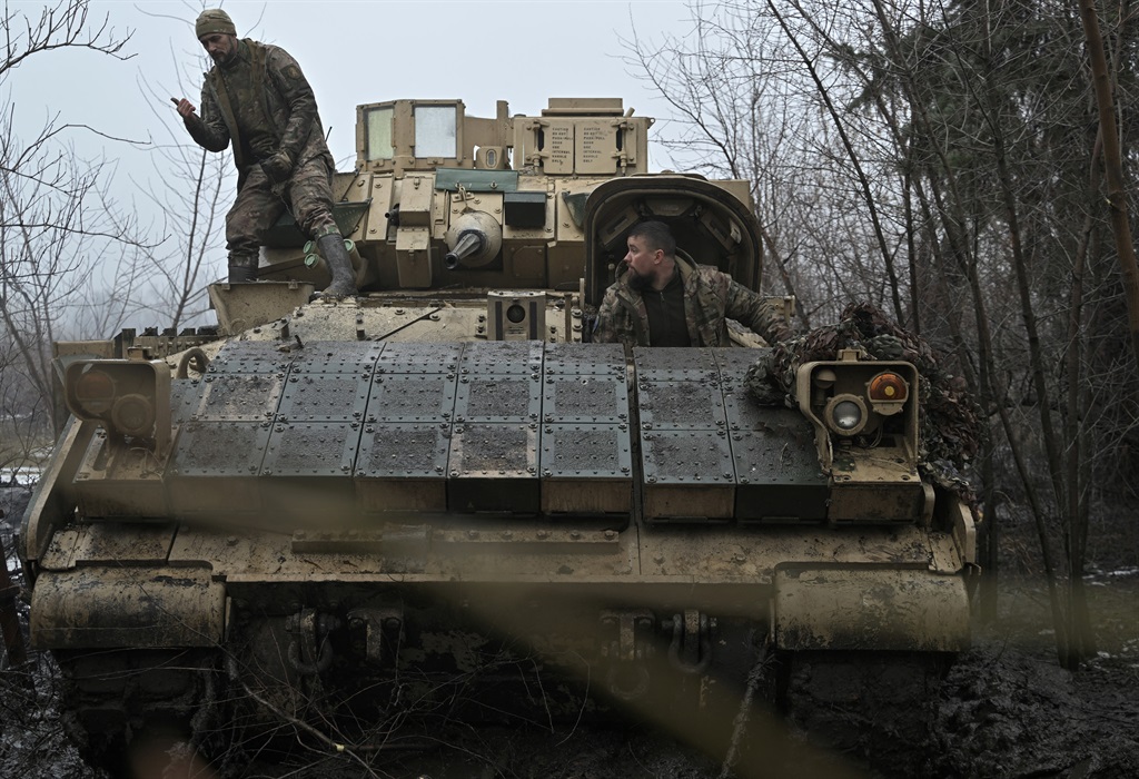 Ukrainian servicemen of the 47th Mechanized Brigade prepare for combat a Bradley fighting vehicle, not far away from Avdiivka, Donetsk region, on 11 February 2024, amid the Russian invasion of Ukraine.