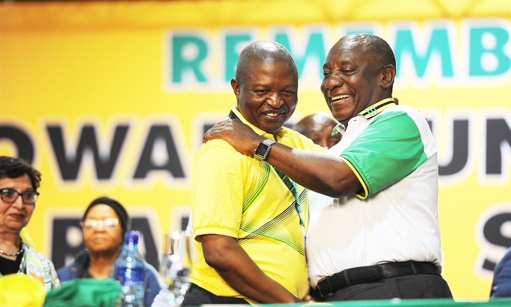 David Mabuza and Cyril Ramaphosa congratulating each other after the results announcement at the ANC National Conference at Nasrec.