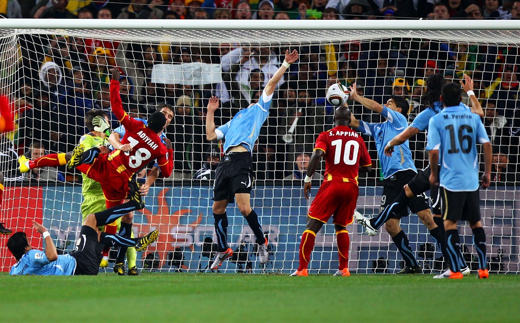 Uruguay striker Luis Suárez handles the ball on the goal line against Ghana during their quarterfinal clash at the 2010 World Cup in South Africa. Photo: Michael Steele/Getty Images