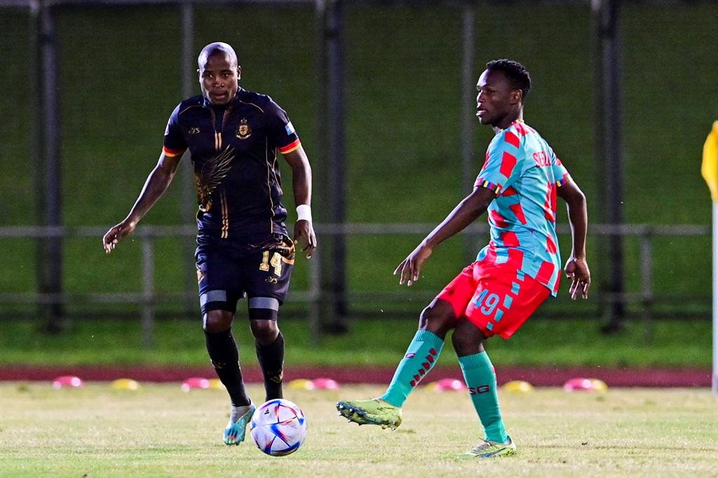 DURBAN, SOUTH AFRICA - JANUARY 03: Kamogelo Sebelebele of TS Galaxy FC and Thabo Matlaba of Royal AM during the DStv Premiership match between Royal AM and TS Galaxy at Chatsworth Stadium on January 03, 2023 in Durban, South Africa. (Photo by Darren Stewart/Gallo Images),>?