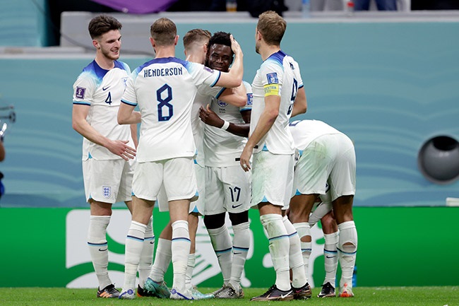 England players celebrate. (Photo by Rico Brouwer/Soccrates/Getty Images)