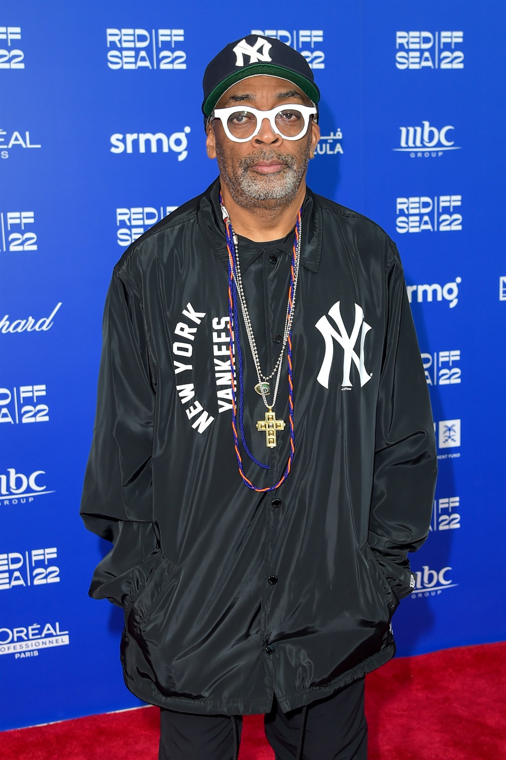Spike Lee poses for photographs ahead of the In Conversation With Spike Lee at the Red Sea International Film Festival on December 04, 2022 in Jeddah, Saudi Arabia. (Photo by Eamonn M. McCormack/Getty Images for The Red Sea International Film Festival)
