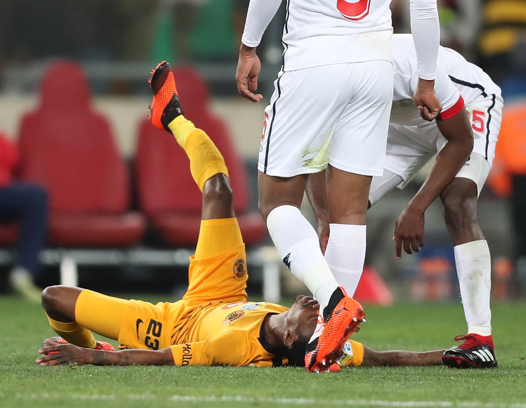 Joseph Molangoane of Kaizer Chiefs reacts in pain after sustaining horrific injury against Free State Stars