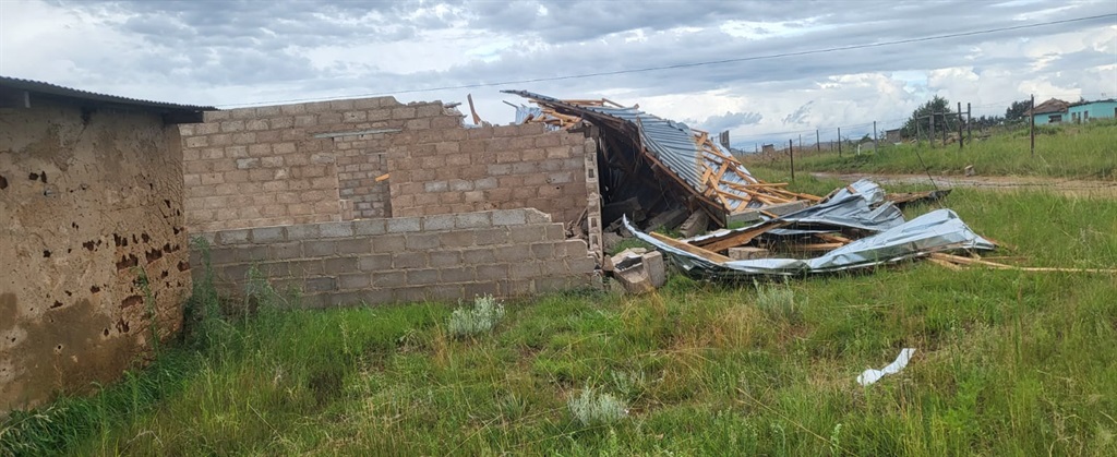 Collapsed structure of home destroyed by storm