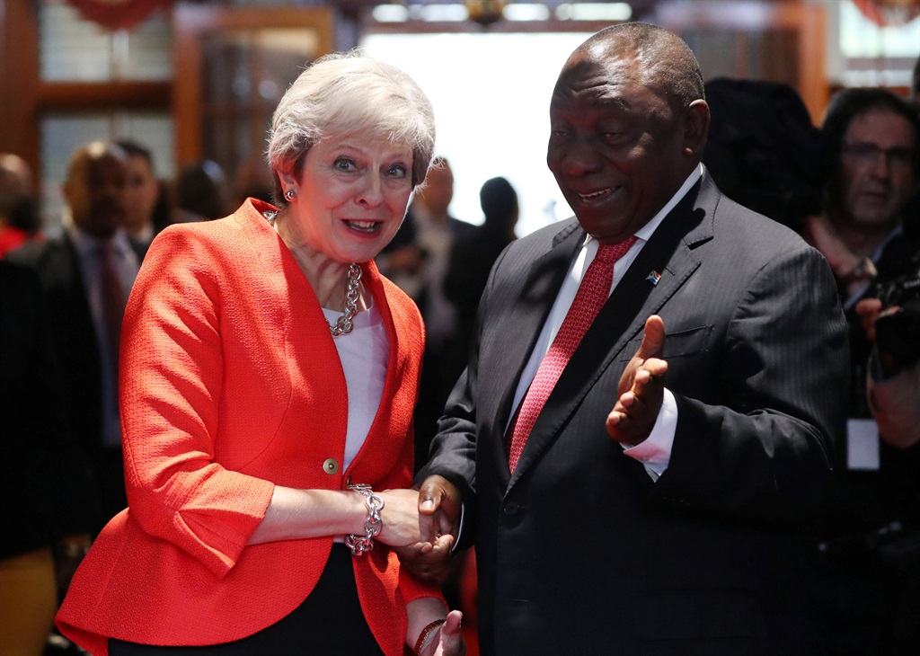 Britain’s Prime Minister Theresa May is greeted by South African President Cyril Ramaphosa in Cape Town on Tuesday (August 28 2018). Picture: Mike Hutchings/Reuters