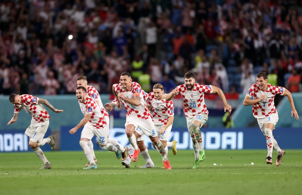 AL WAKRAH, QATAR - DECEMBER 05: Croatia players celebrate after winning the penalty shoot out during the FIFA World Cup Qatar 2022 Round of 16 match between Japan and Croatia at Al Janoub Stadium on December 05, 2022 in Al Wakrah, Qatar. (Photo by Julian Finney/Getty Images)