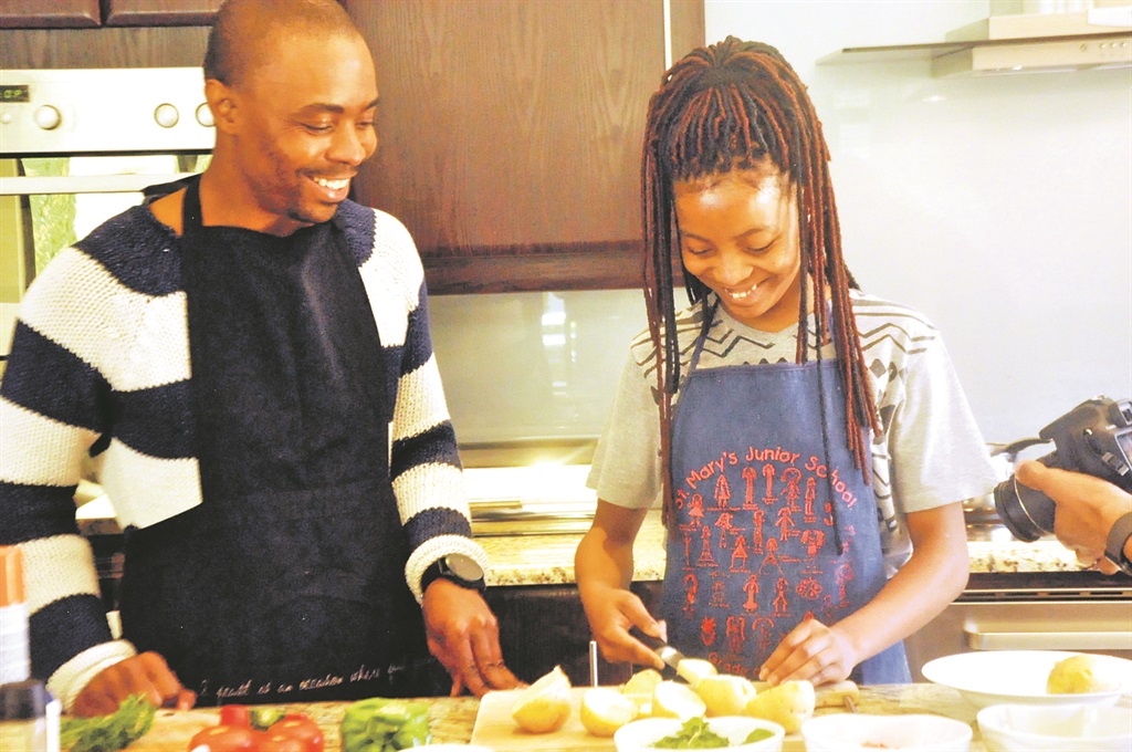 Celebrity William Lehong prepares vegetables with his daughter – the food they love the most.          Photo by Thabo Monama