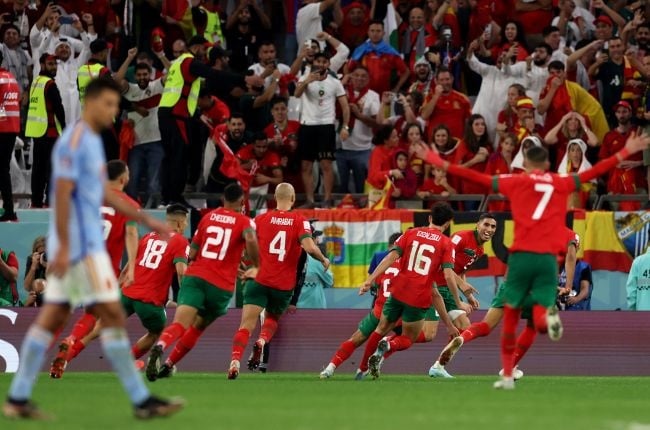 Morocco players celebrate. (Photo by Clive Brunskill/Getty Images)