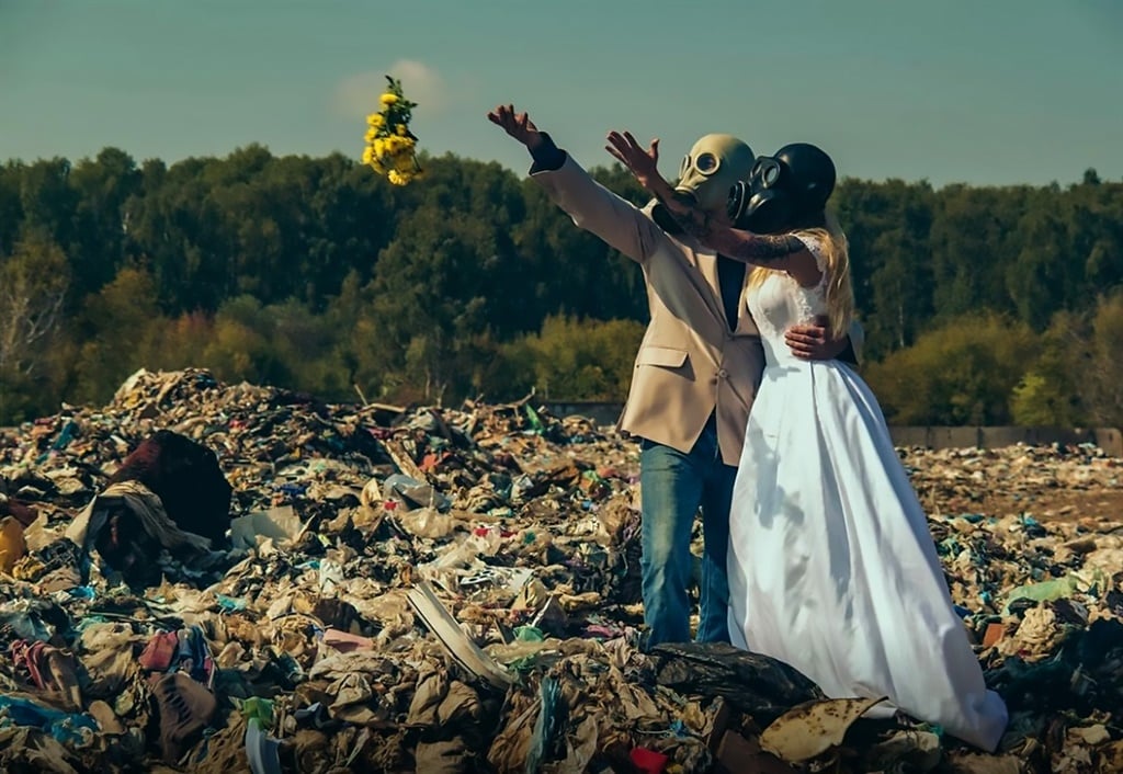 Russian couple on their "waste wedding" photo shoot. Credit: Magazine Features