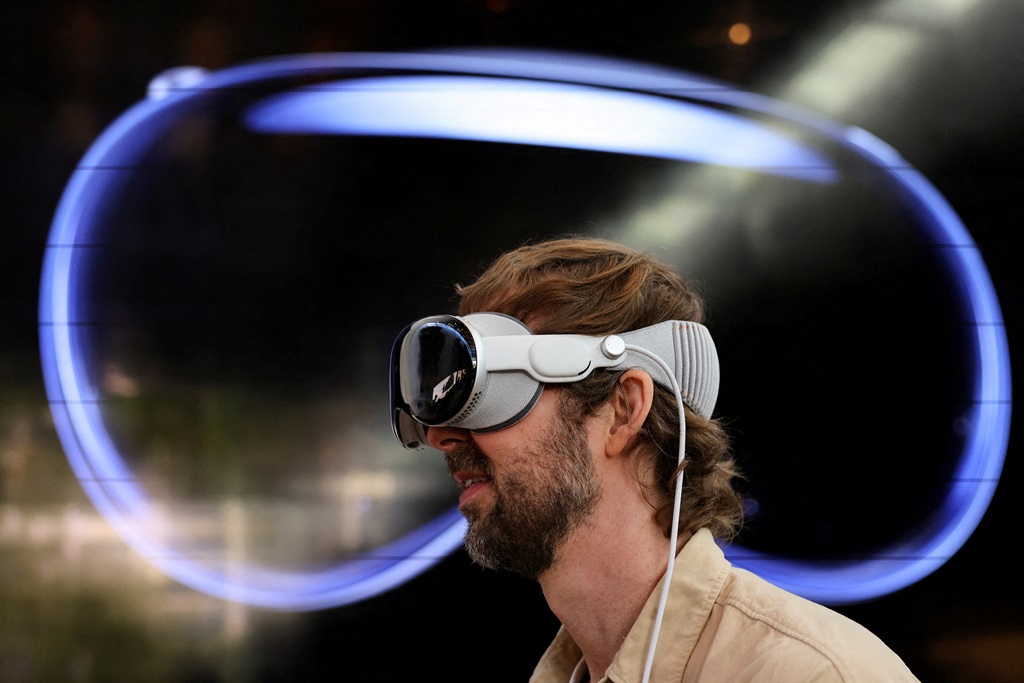 A customer uses Apple's Vision Pro headset on the day it goes on sale for the first time in Los Angeles, California, U.S. on 2 February 2024 