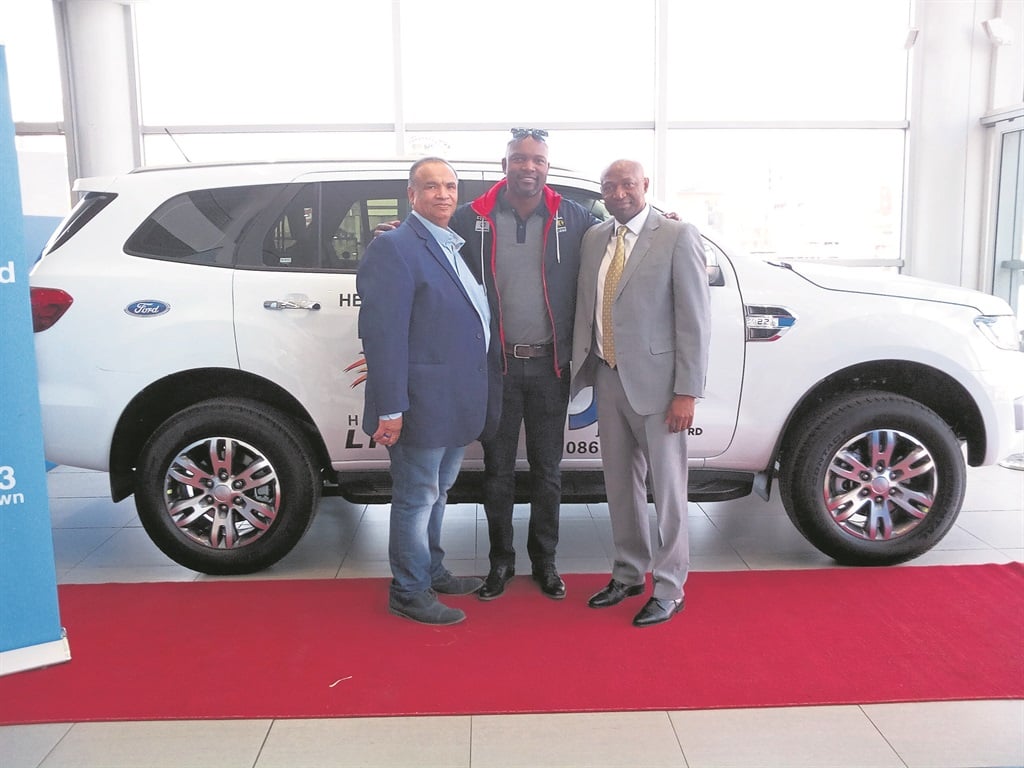 From left: CEO of Highveld Lions Greg Fredericks, Enoch Nkwe, the coach of Highveld Lions and Stephen Nale, MD of Joburg City Ford during the handover in Newtown, Joburg. Photo by Kopano Monaheng