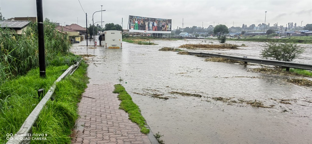 Sixty-five passengers were rescued from from a bus stuck on a flooded road with raising water levels following heavy rain that stuck Gauteng Friday morning.

