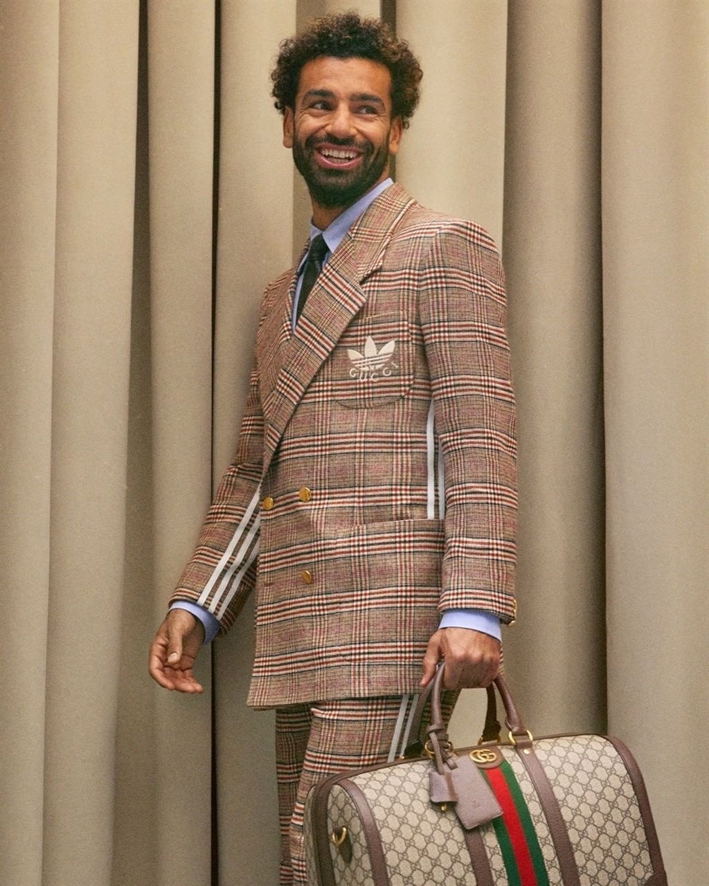 Mo Salah rocking a pricey Gucci suit for his 'A He