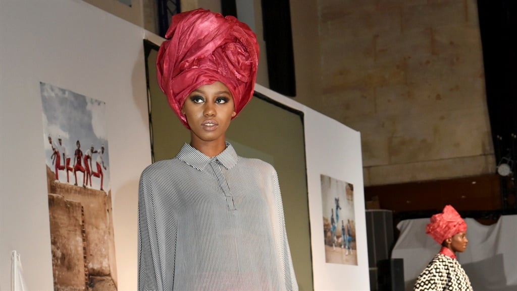 Headwraps have long been popular in Africa. A model walks the runway at 'Labo International': 10th Edition African Ethnic and Sapeurs Fashion Show at Espace des Blancs Manteaux