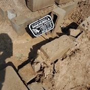 Suspects caught trying to exhume corpse!