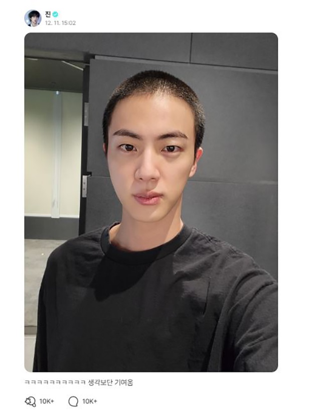 Jin with his military haircut.