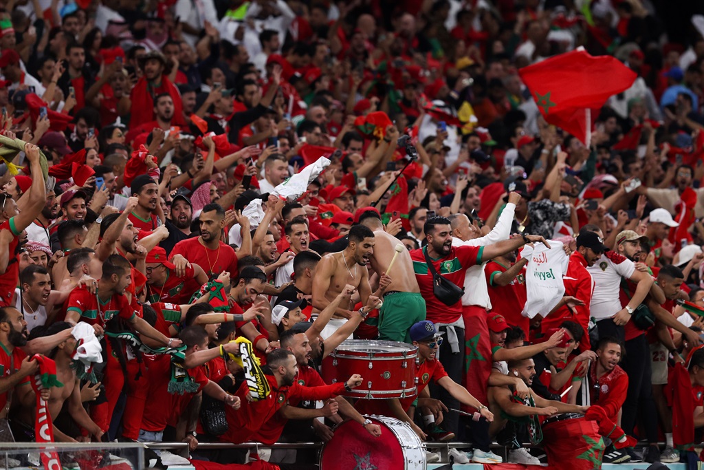 Morocco fans celebrate the Atlas Lions' historic qualification for the World Cup semifinals. Photo: Zhizhao Wu/Getty Images