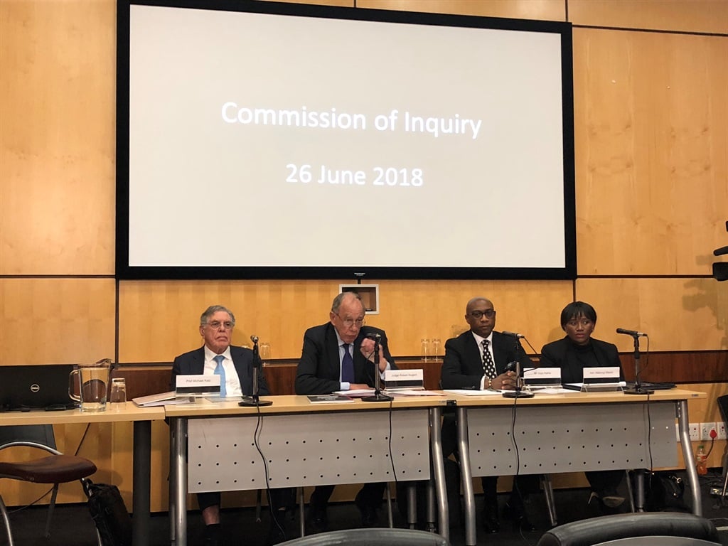 Professor Michael Katz, Judge Robert Nugent, Vuyo Kahla and Advocate Mabongi Masilo. Nugent is leading the commission of inquiry into the South African Revenue Service and Katz, Kahla and Masilo are supporting the investigation.